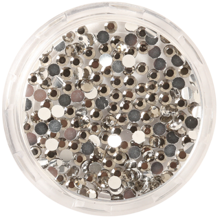 Round container filled with silver coloured rhinestones on a white background
