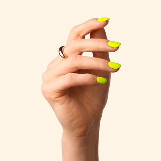 ROXI Lemon gel polish applied to nail tip, glossy finish