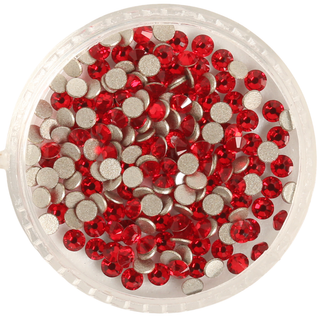 Clear container filled with red round stones on a white background