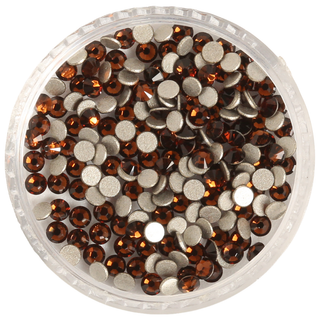 Round container filled with brown rhinestones on a white background