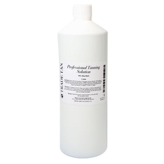 White bottle of professional tanning solution on a white background